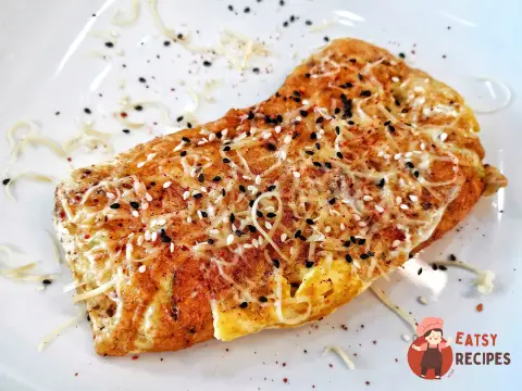Яєчня з цибулею та спеціями