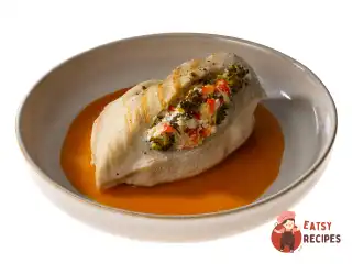 Курячі грудки на пару, фаршировані овочами з мандариновим соусом