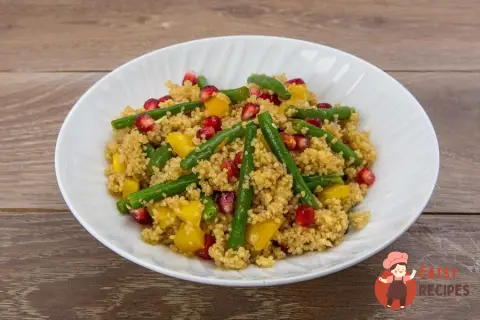 Кускус з квасолею, гранатом та солодким перцем