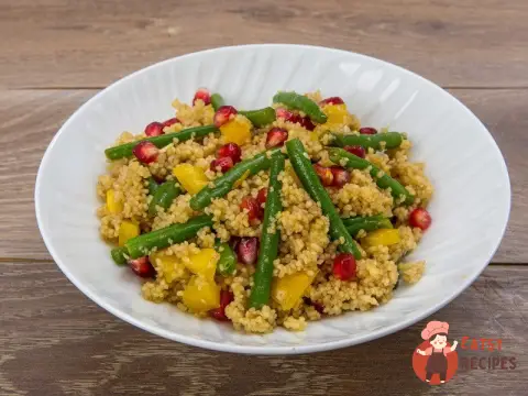 Кускус з квасолею, гранатом та солодким перцем
