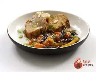 Свинина з карамелізованою морквою