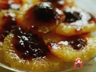 Апельсини під теплим соусом малиновим