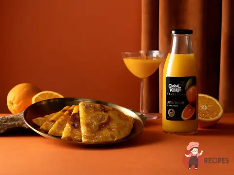 Млинці з апельсиновим соусом