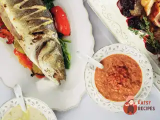 Сибас з мухурмою з волоських і таратором з кедрових горіхів