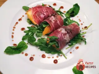 Закуска з хурмою та пармською шинкою