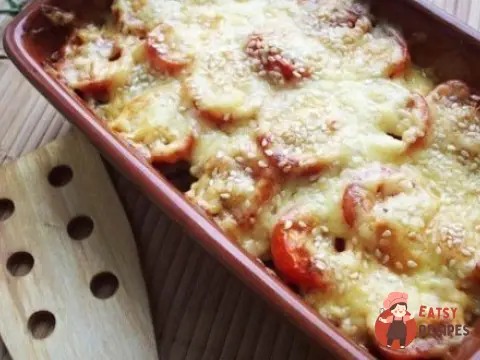 Кабачки, запечені з печерицями та помідорами під сиром