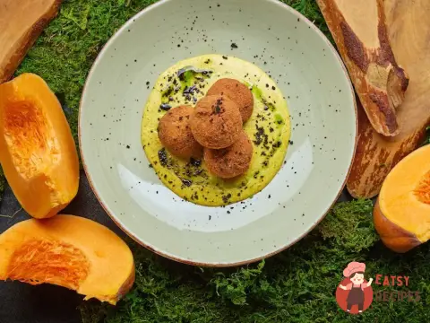 Хрусткі кулі аранчіні з соусом каррі