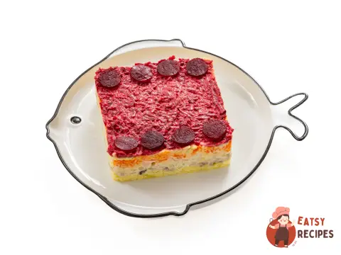 Оселедець під шубою з цибулею