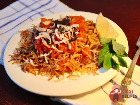 Смажені макарони з томленими помідорами