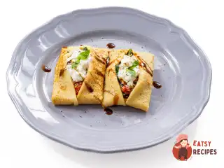 Млинці зі шпинатом та страчателлою