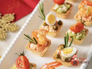 Тарталетки з тунцем, кремом з креветки та авокадо