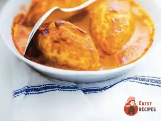 Кнелі зі щуки із соусом нантюа