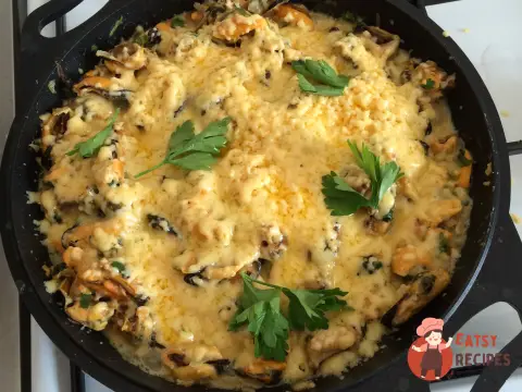 Мідії під сиром