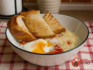 Яйця пашот з йогуртовим соусом з зеленню