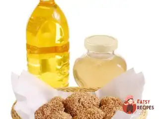 Коржики з медом і кунжутом у сиропі