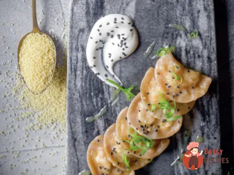 Цільнозернові вареники з кускусом та індичкою