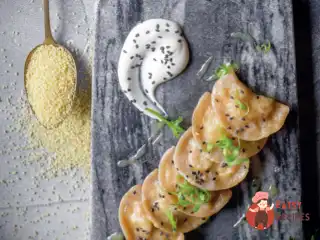 Цільнозернові вареники з кускусом та індичкою