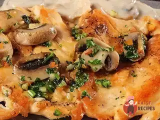 Курка з печерицями по-французьки