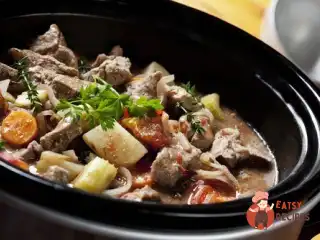 Печеня з курячих сердець з овочами та пивом