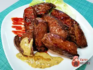 Медальйони з яловичини з французьким соусом