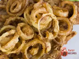 Біфштекс із цибулею