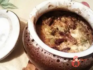 Курячі серця з овочами в горщику