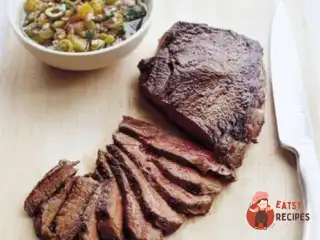 Яловичина в апельсиново-оливковому соусі