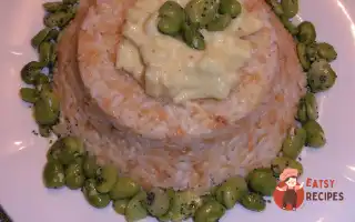 Тімбалло З Рису Та Різони З Яблуками В Каррі Та Бобами