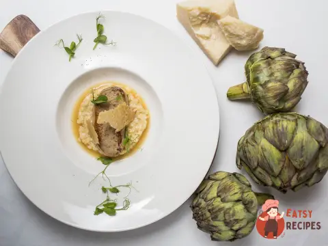 Різотто з кореня селери з качиною фуа-гра та бульйоном