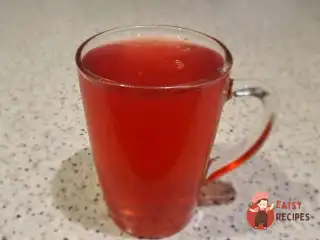 Компот з яблук, персиків та винограду