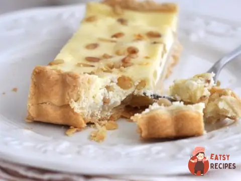 Лимонний чізкейк з кедровими горіхами