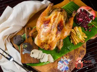 Ніжка бресської пулярки, запечена в печі, з молодими овочами