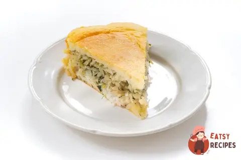 Заливний пиріг на кефірі з рибою та капустою.