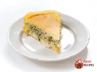 Заливний пиріг на кефірі з рибою та капустою.