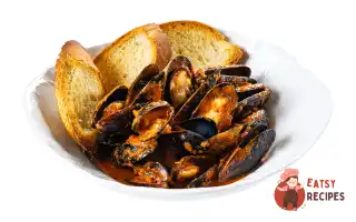 Мідії в томатному соусі