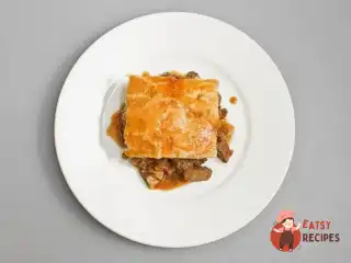 Англійський пиріг з баранячими бруньками та білими грибами Андрія Бугайського