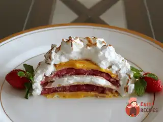 Запечена аляска з млинцями, полуничним желе та апельсиновим курдом
