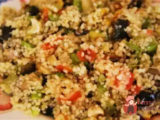 Кускус з овочами, апельсином та горіхами