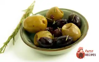 Тепла Закуска З Маслин Та Оливок З Фенхелем, Часником Та Цедрою Апельсину