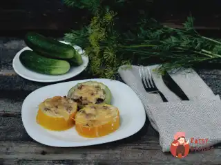 Кабачки з фаршем та грибами