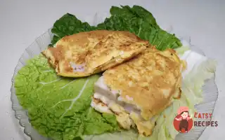 Камбала в сирному клярі