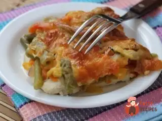 Курка запечена з овочами