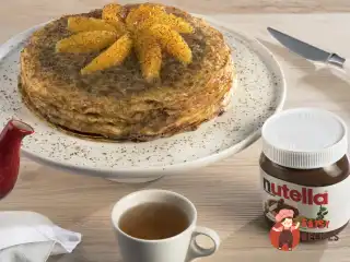 Французький млинець з Nutella® і апельсиновою цедрою