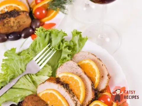 Свиняче печеня з апельсинами та хересом