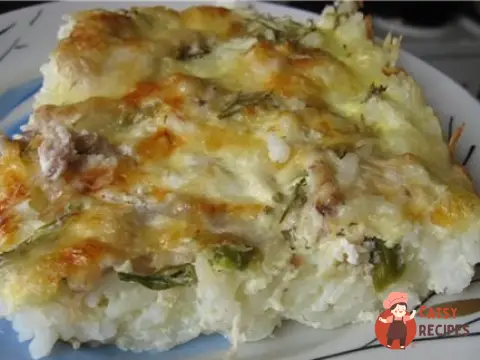 Рисова запіканка з куркою та соусом бешамель