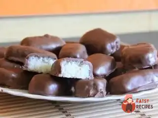 Вершкові баунті у молочному шоколаді