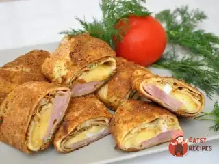 Млинці з начинкою в паніровці