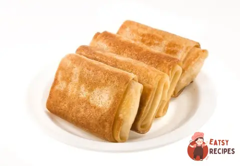 Млинці з сиром, яблуками та іншими начинками
