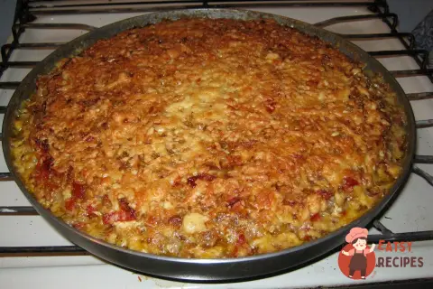 Овочеве асорті з м'ясом, рисом та сиром